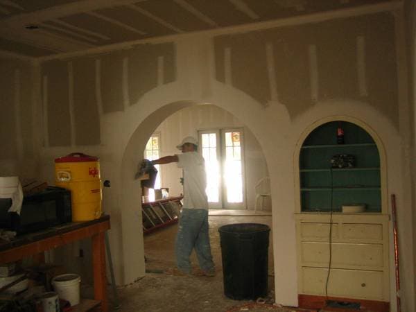 Interior room drywall hung and prepped for finishing.